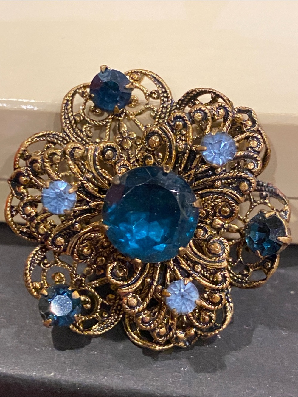 Check Glass Gold Tone Filigree Brooch with Blue Czech Crystals
